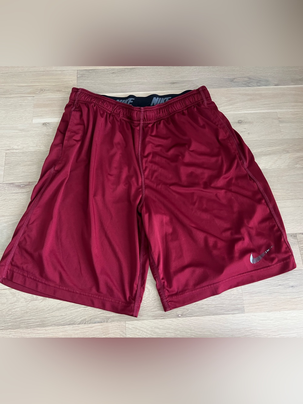 Nike Red Dri-FIT Athletic Shorts with White Swoosh
